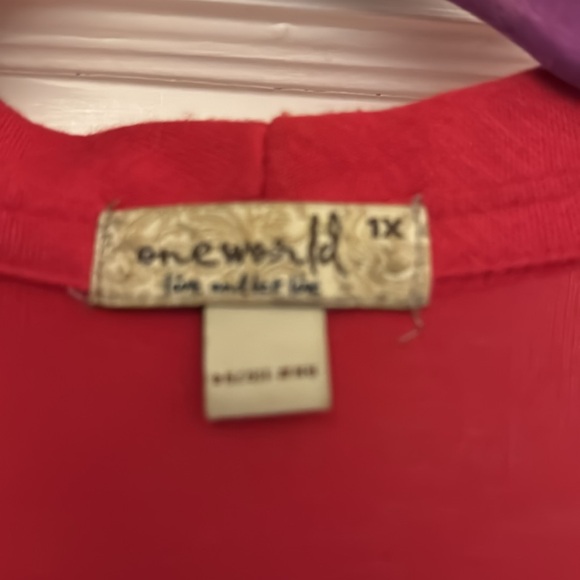 Red jacket with black detail. - Picture 2 of 5